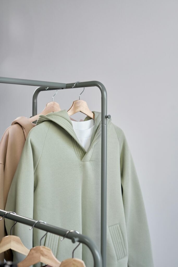 Cause-driven hoodie with 'normal' on the outside and empowering message hidden on the inside.